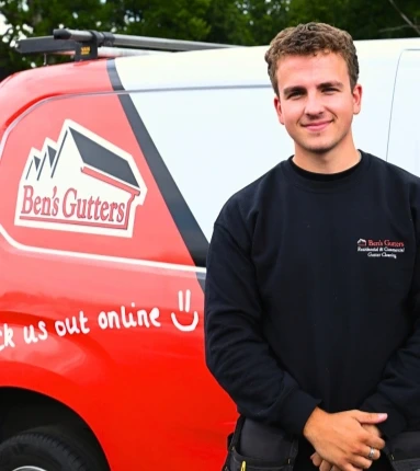 our gutter cleaner in Durham standing by company vehicle